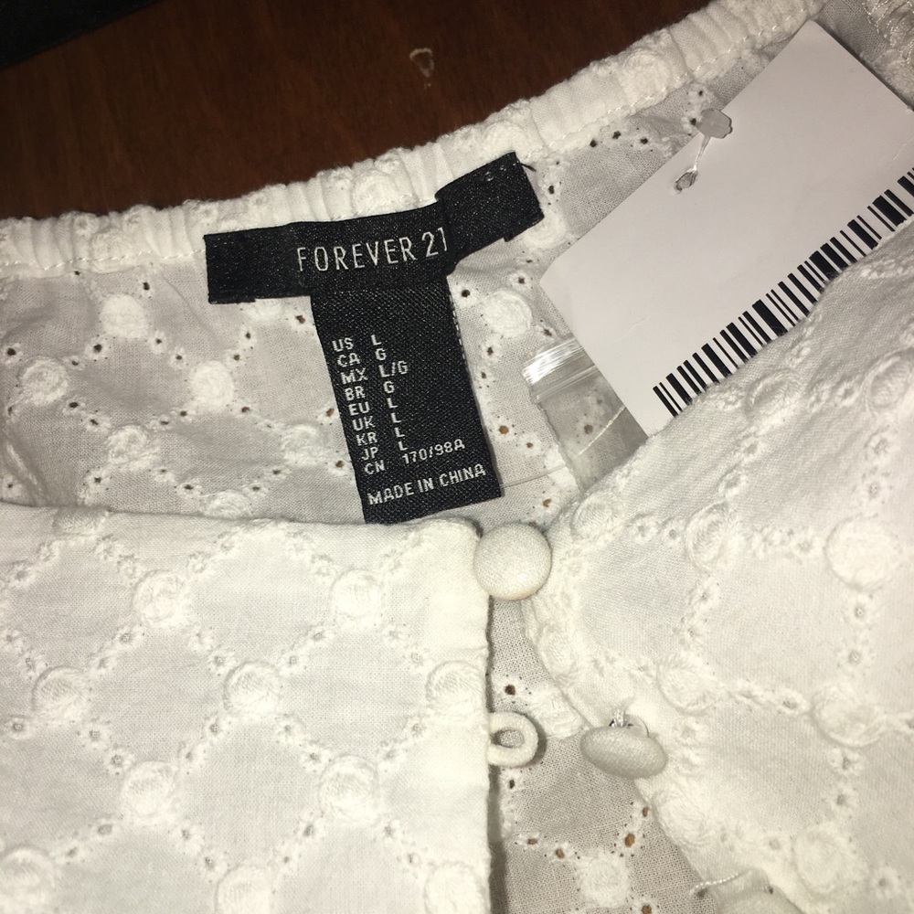 Flowy button up top. New with tags